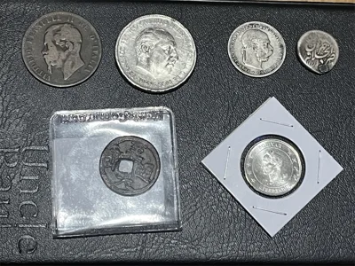Coins of 4 continents : kings, liberators, sultans and dictators