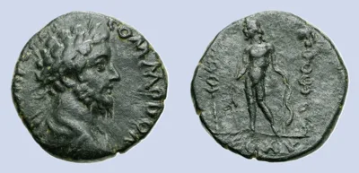 Legionary ARMENIA Satala Commodus AD 177-192 AE Bronze (24mm 9,16g) IMP CAES COMOΔO AV. Laureate, draped and cuirassed bust right  LEG XV Apollo standing left, holding branch and bow between Standards