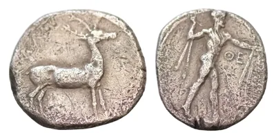 Bruttium, Kaulonia AR 21mm 7,5g.  Stater. c. 475-425 BC. Nude Apollo walking to right, holding laurel branch in upright right hand,  KAVΛ downwards to left / Stag standing to right